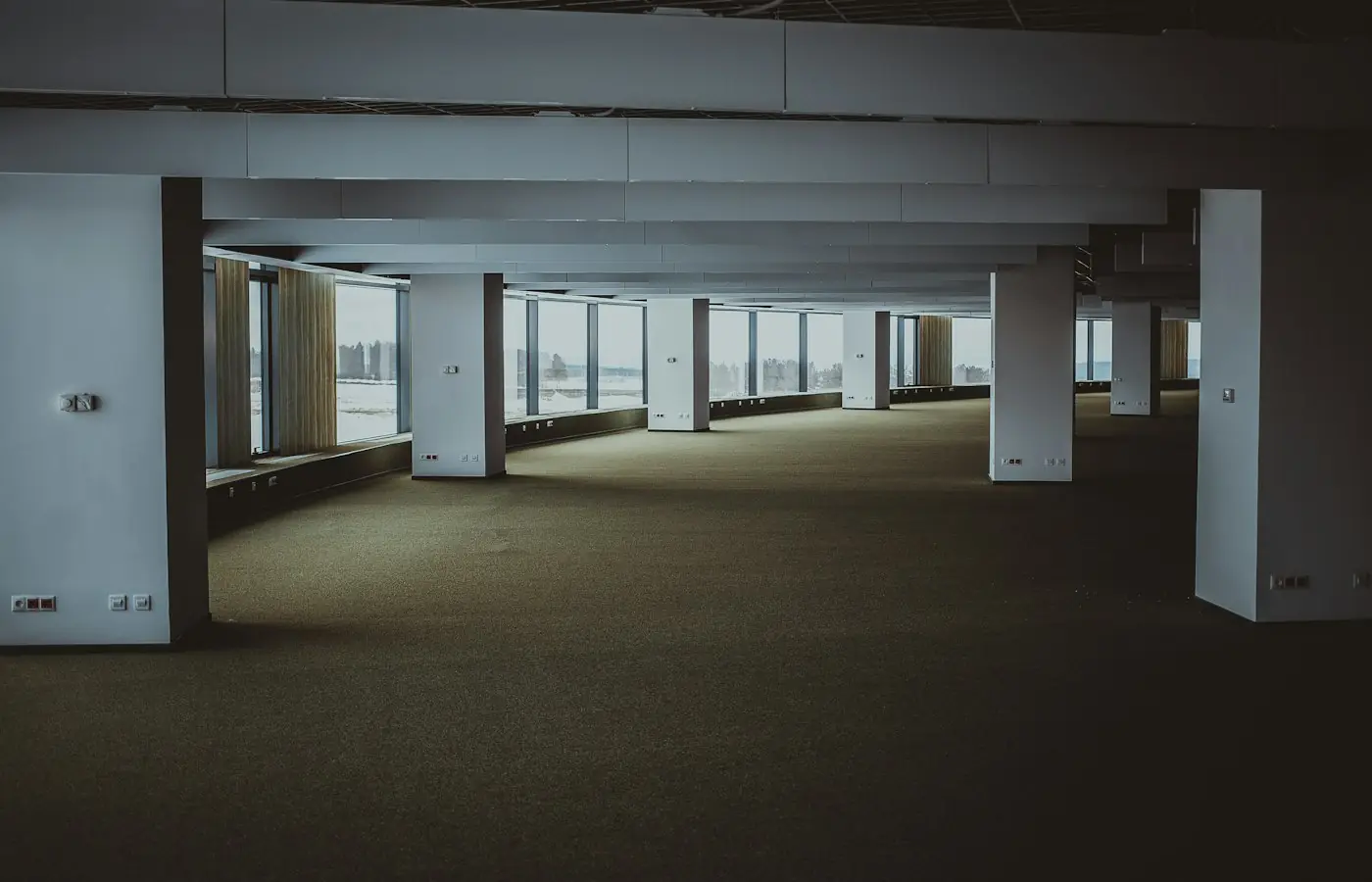 Empty commercial office shell with structural columns before a tenant build-out (stock photo)